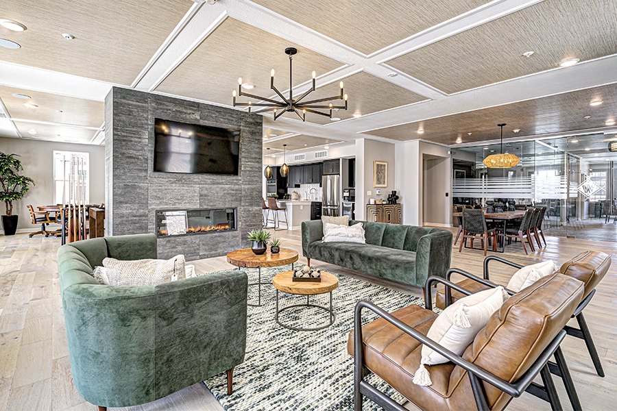 Newer communities like Wheelhouse Apartments offer competitive rates to keep new Residents happy. A stylish common area in Wheelhouse Apartments club house